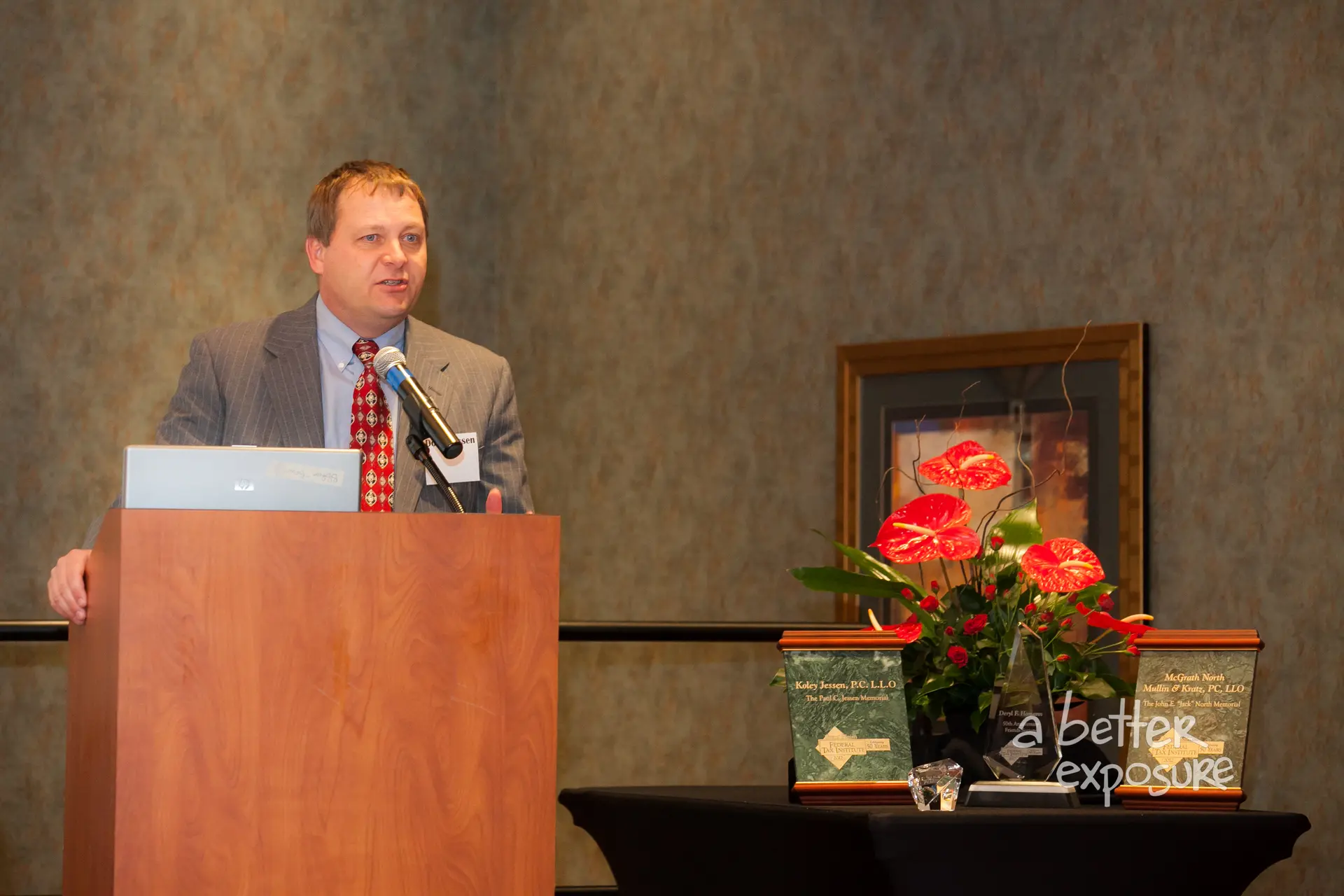 Master of Ceremonies Don Janssen provides a history of the organization
