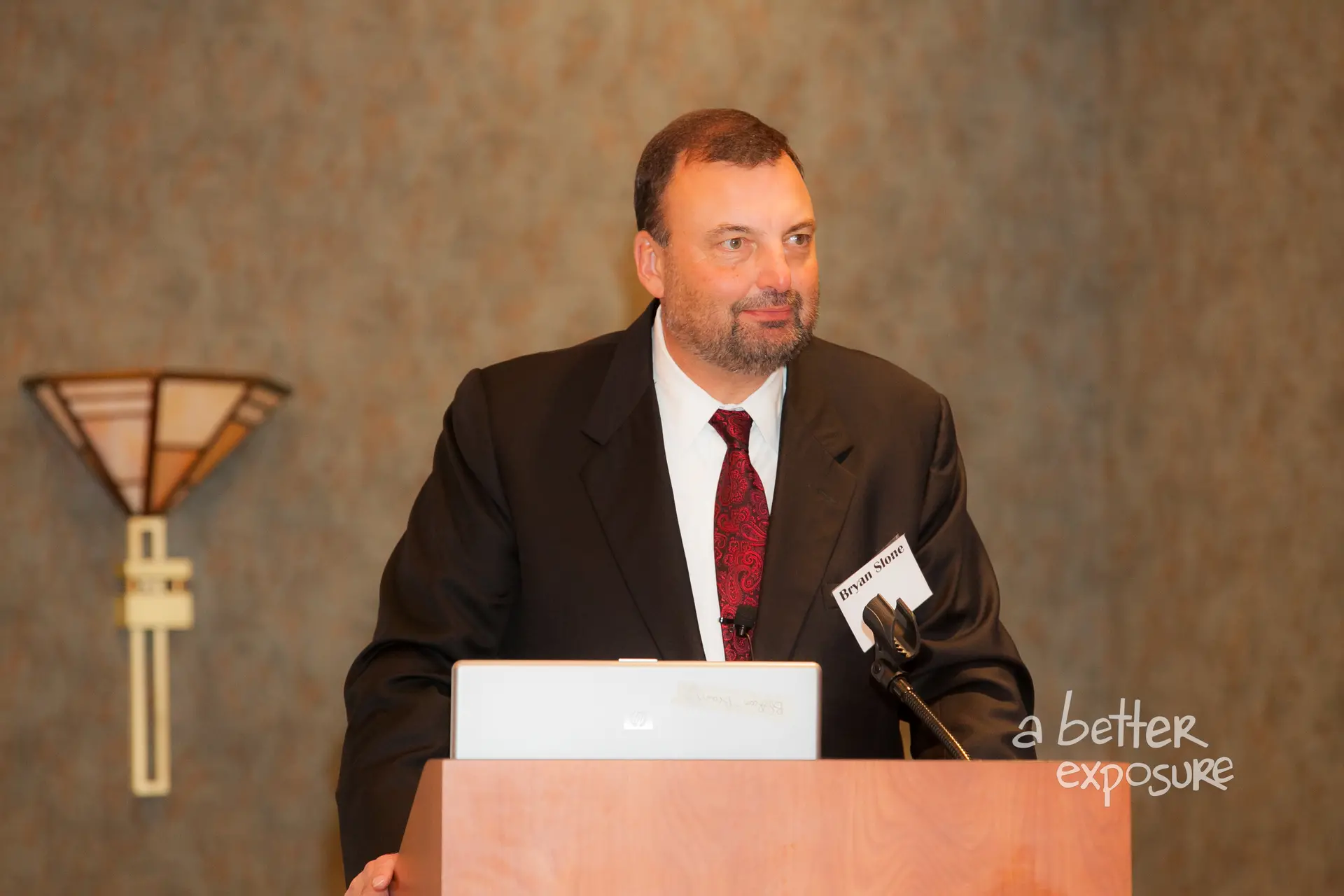 Bryan Slone introduces keynote presenter Larry Gibbs